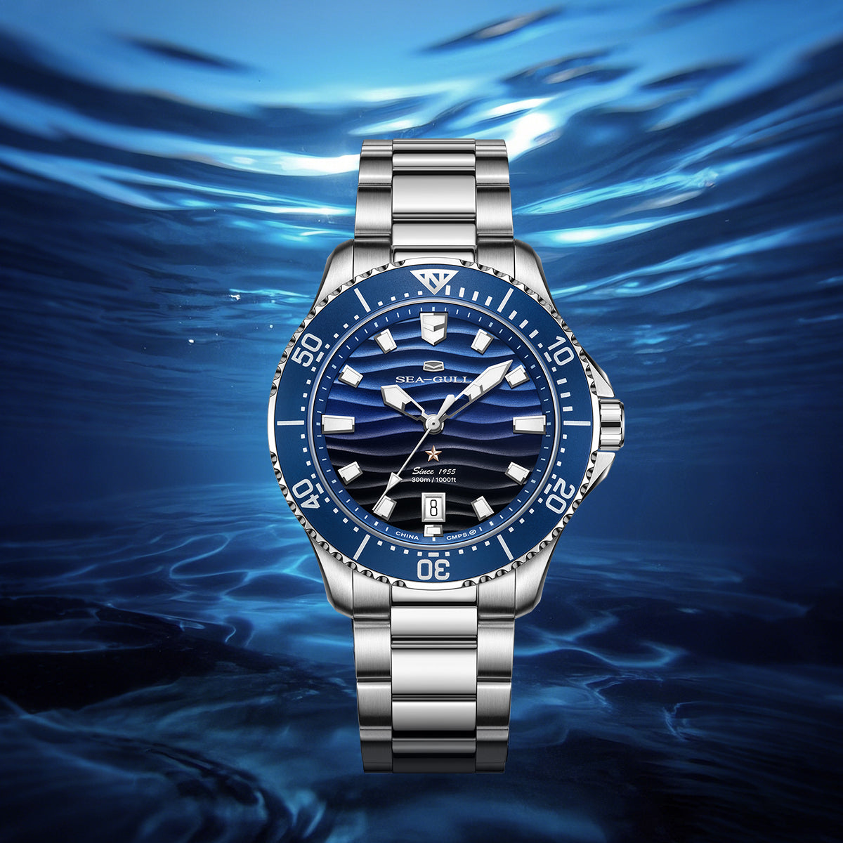 Silver watch with a blue dial on a blue water background