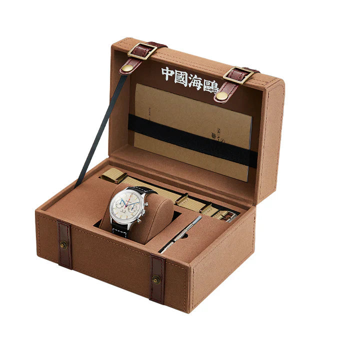 Seagull 1963 Chronograph Watch in an open brown leather box with a pen and small black box