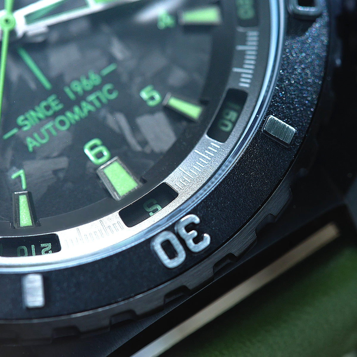 Close-up of Seagull Dongfeng Series Carbon Fiber Dial Tactical Watch  face with green markers and numbers
